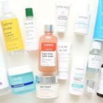 Assorted drugstore skin care products for hormonal acne.